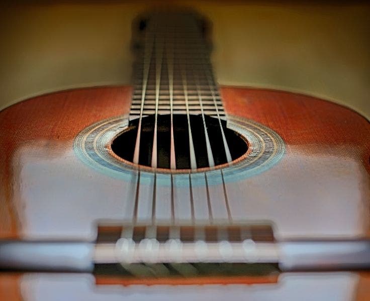 a close up of a guitar